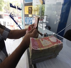 Money supply MO drops in Iraq 218385637